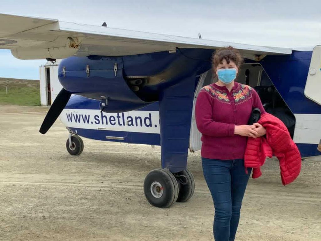 Janette getting ready to board the 6 seater Islander plane, operated by Airtask from the Tingwall Airport.